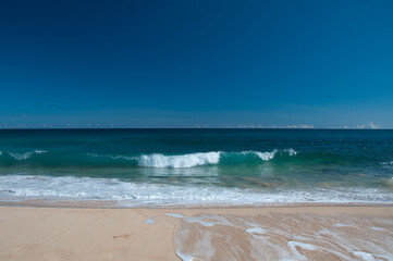 Waves on a beach in Poipu Kauai Hawaii during the Day
