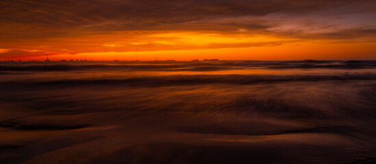 Obraz premium Long Exposure twilight beach panorama with copy space