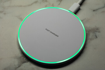 Wireless magnetic charger, modern equipment for mobile phone.