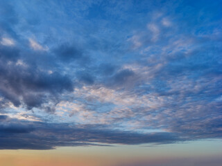 White clouds in the blue sky and sunset
