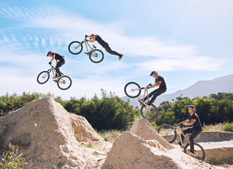 Jump, cycling and person on dirt bicycle with adventure, adrenaline and speed in stunt competition,...