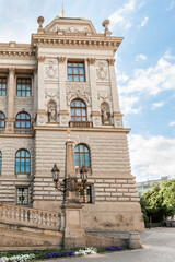 Decorated with stucco bas reliefs the facade of Peoples Museum on famous Wenceslas Square in Prague in Czech Republic