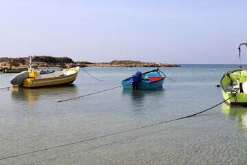 a berth for mooring yachts and boats in a seaport.