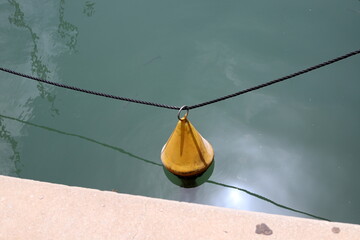a berth for mooring yachts and boats in a seaport.
