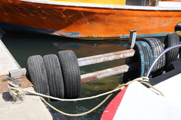 a berth for mooring yachts and boats in a seaport.