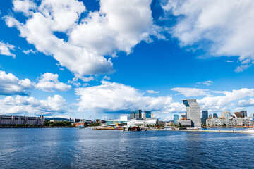 Oslo city center cityscape with modern buildings on waterfront in Oslo, Norway.