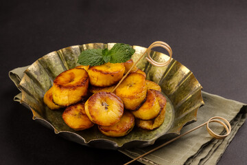 Platanos Maduros or Fried Sweet Plantain is a Side Dish in Latin and Caribbean Snack.