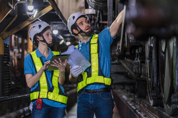 Engineer checking construction process railway and checking work on railroad station . Railway...