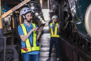 Engineer checking construction process railway and checking work on railroad station . Railway...