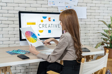 Young asian woman graphic designer working in office. Artist Creative Designer Illustrator Graphic...