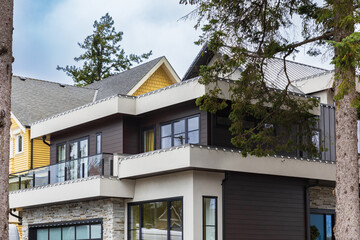 New Modern House Apartment Buildings in Vancouver BC. Canadian modern residential architecture on sunny summer day