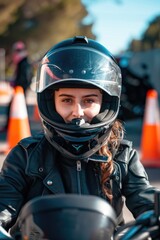 A woman riding a motorcycle while wearing a protective helmet
