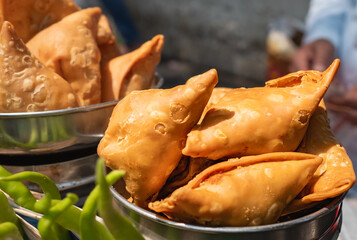Fried Potato Samosa. Indian snack. Samosa plate closeup.
