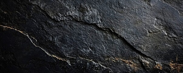 Black rough grainy stone texture background