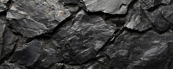 Black rough grainy stone texture background