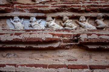 Human like figures incorporated into the exterior of the Tivanka Image House at Polonnaruwa in Sri Lanka. Also known as the Image House of Jetavanarama it was built by King Parakramabahu the Great.