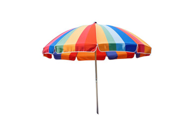 A colorful beach umbrella with vibrant stripes set up on a sandy beach with a clear blue sky in the background