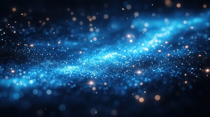 Abstract blue glitter backdrop featuring sparkling light reflections.