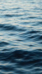 Naklejka premium minimalist style with clean lines, a close-up of ocean waves with gentle ripples, seascape art, close up view, smooth textures,
