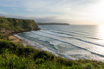 Los Locos beach by sunset surfing spot Suances coast Cantabria Spain