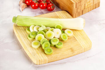 Ripe sliced leek over board