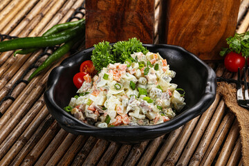 Traditional Russian salad with mayonnaise