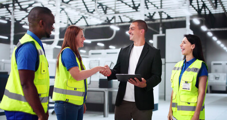 Teamwork At Factory. Industrial Technology Engineer