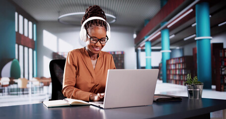 Student College In School Campus Using Laptop