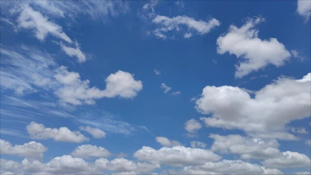 Ceremonial landscape of cirrus clouds moving in the afternoon