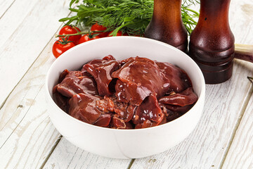 Raw chicken liver uncooked in the bowl