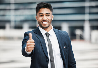 Portrait, smile and businessman with thumbs up in city for success, support or quality work of urban planner. Face, like hand gesture and corporate expert with sign for review, excellence or good job