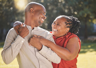 Senior couple, black people and laughing outdoor with hug for bonding, love and commitment in marriage. Mature, man and woman with joke, embrace and romance in park in nature for holiday and support