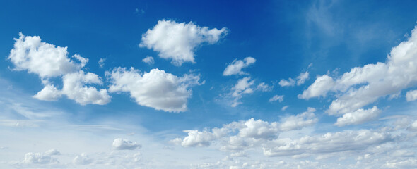 The sky is blue with many clouds