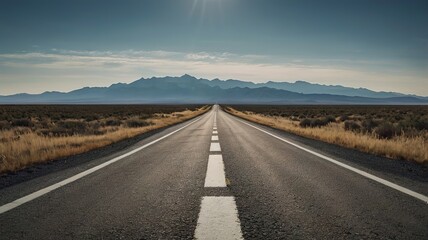 Straight road disappearing into the horizon, lane divider in the middle