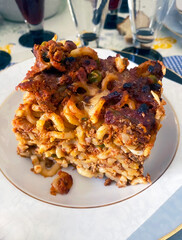 A just served dish of  Sicilian timbale of Anelletti with ragù sauce. 