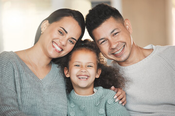 Relax, portrait and child with parents on sofa in home for bonding, security and family time. Smile, happy and girl kid with mom and dad in living room for care, love or connection at house in Brazil