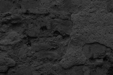 Old black wall tetxure. Grunge background
