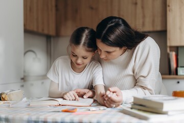 Mother and Daughter Studying Together