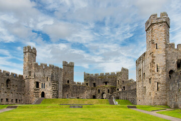 Courtyard of medieval fortress Caernarfon Castle, Caernarfon, UK a motte-and-bailey castle from 11th century which King Edward I of England began to replace with the current stone structure in 1283 © Sonja