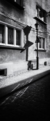 A STREET IN THE CITY - Stylish street lamp and old tenement houses in the background  © Wojciech Wrzesień