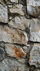 Fototapeta premium Rough Stone Wall: A Close-Up of Time-worn Texture