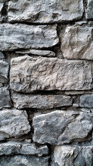 Obraz premium Rough-Hewn Stone Wall: A Textured Canvas of Time