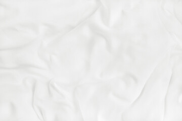 Texture of white blanket and bedding sheet with crumpled or messy in bedroom after wake up.