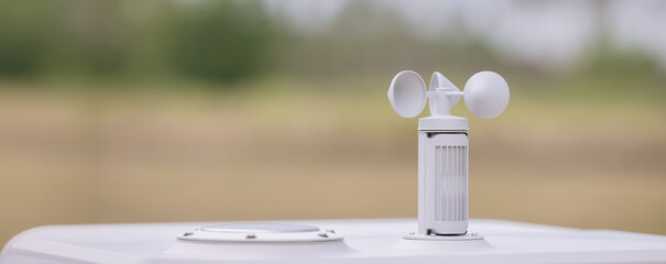 Cup anemometer rotates when the sky is overcast. Wind mast for measuring wind speed, pyranometers...
