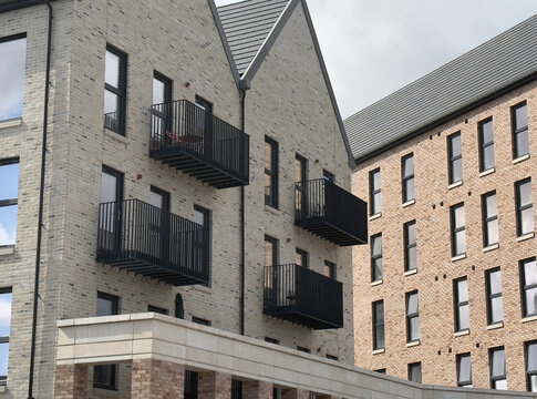 Modern high rise flats at new development - Powered by Adobe