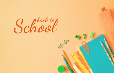 School supplies on yellow background. Back to school, education concept