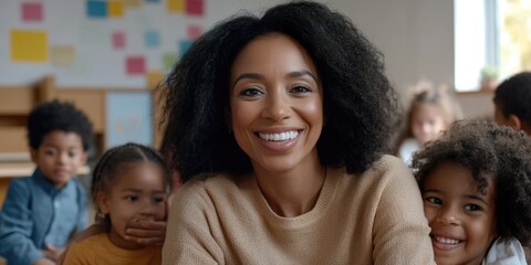 Happy Teacher with Students in Classroom