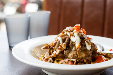 Beef pasta with tomato sauce in restaurant