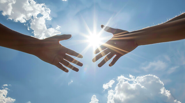 Hand of a man with forefinger reaching out to touch a point against the sky, silhouette, sunset, gesture, aspiration, concept