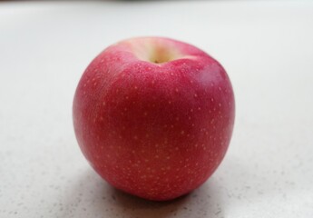 red apple on a plate